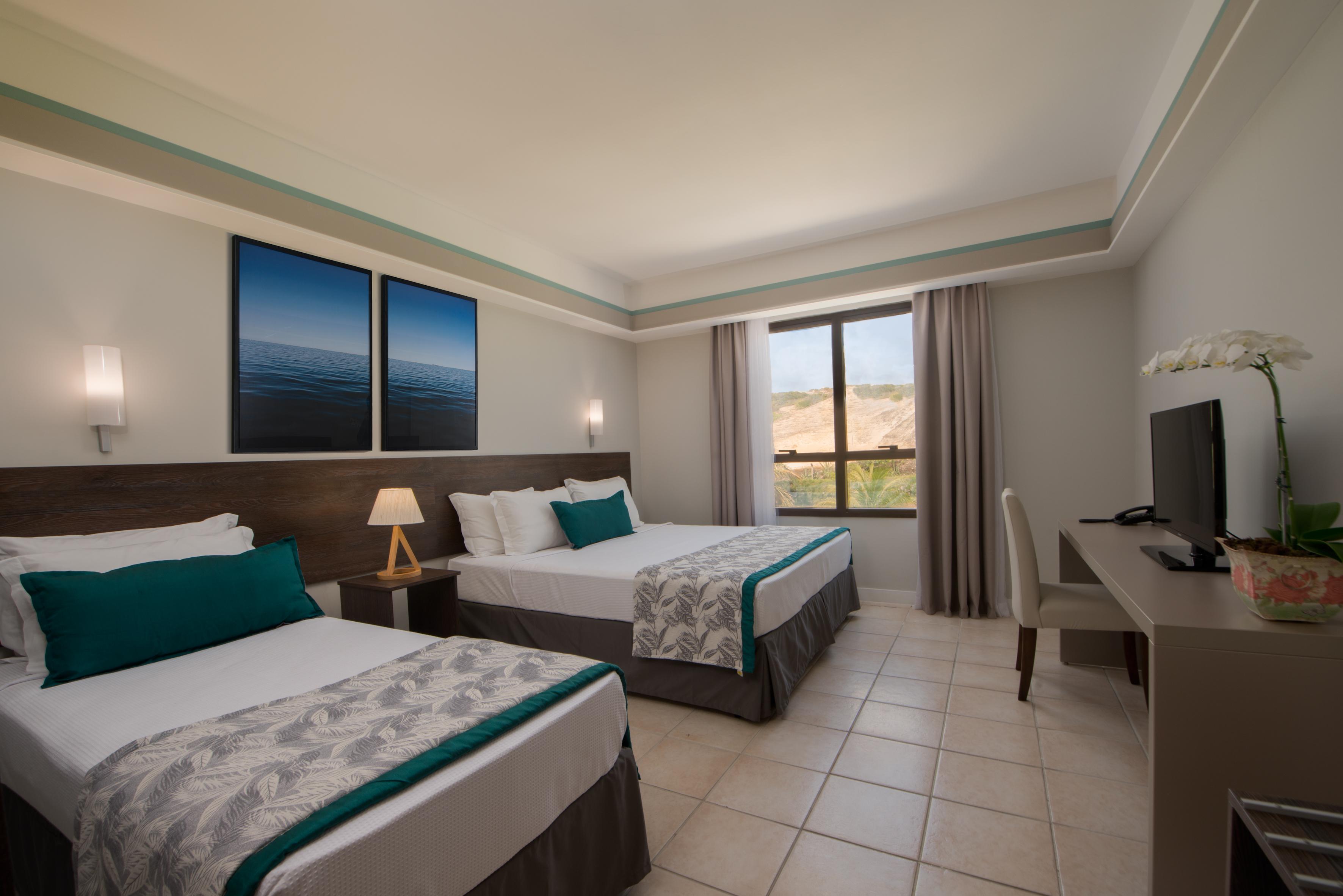 Отель Wish Натал Экстерьер фото A room at the hotel