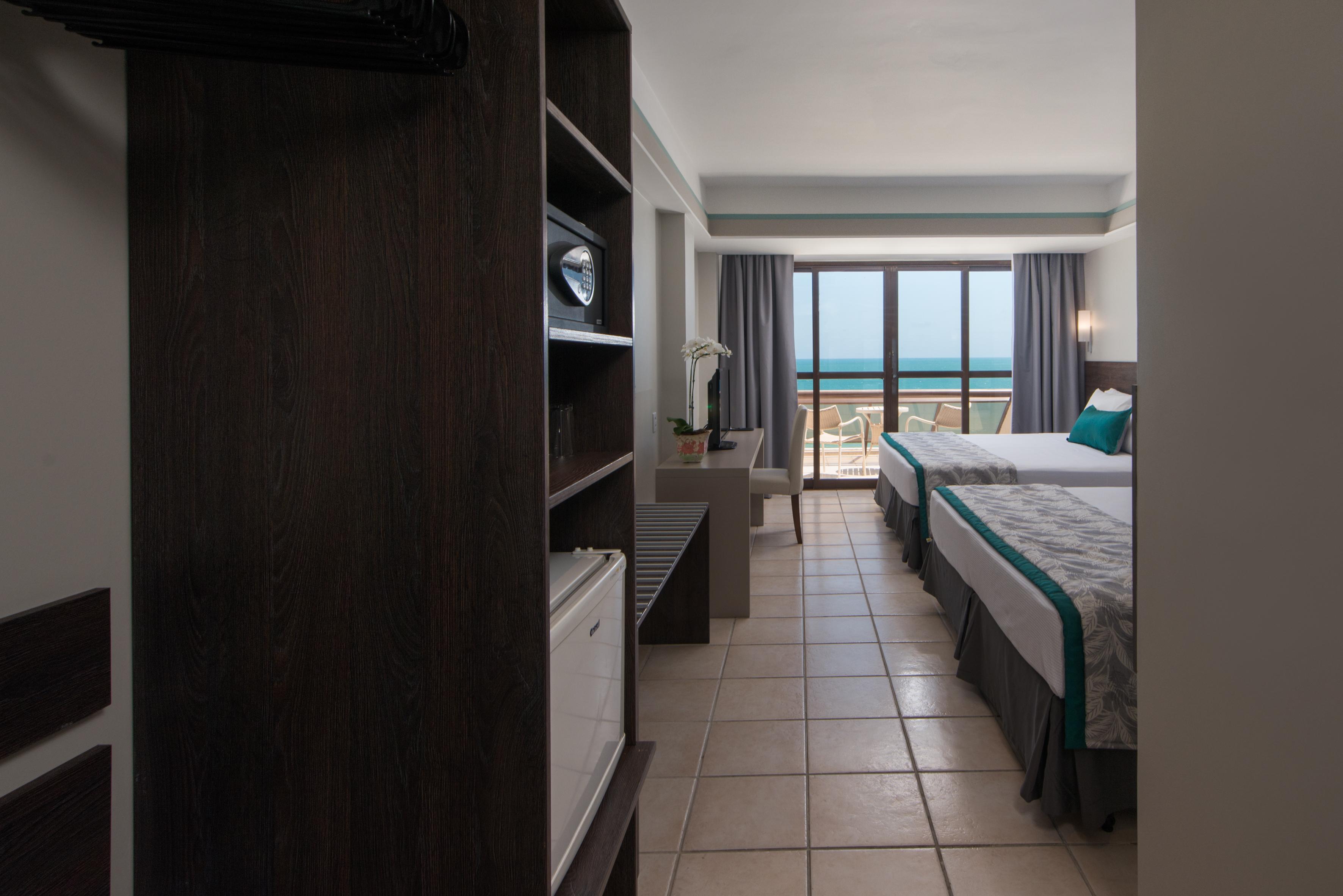 Отель Wish Натал Экстерьер фото A room at the hotel