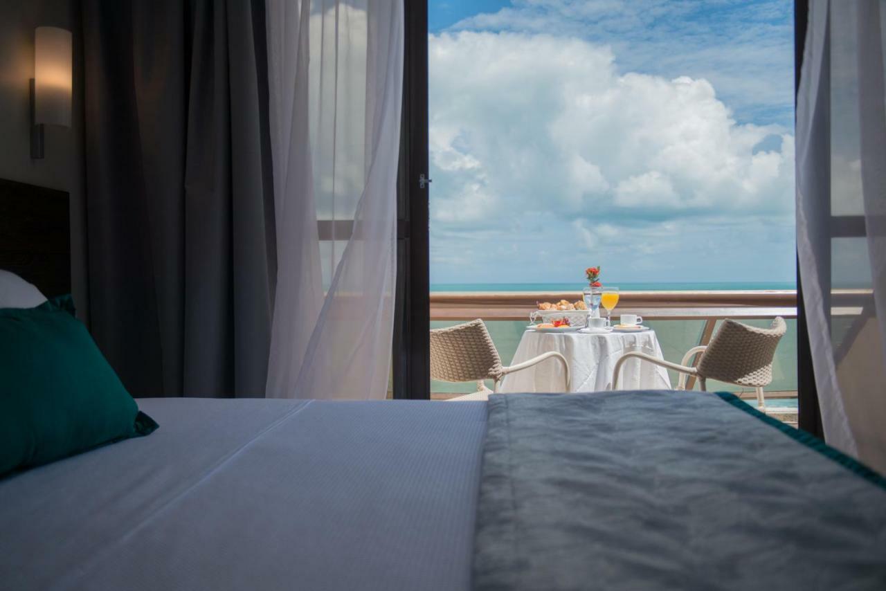 Отель Wish Натал Экстерьер фото A room at the hotel